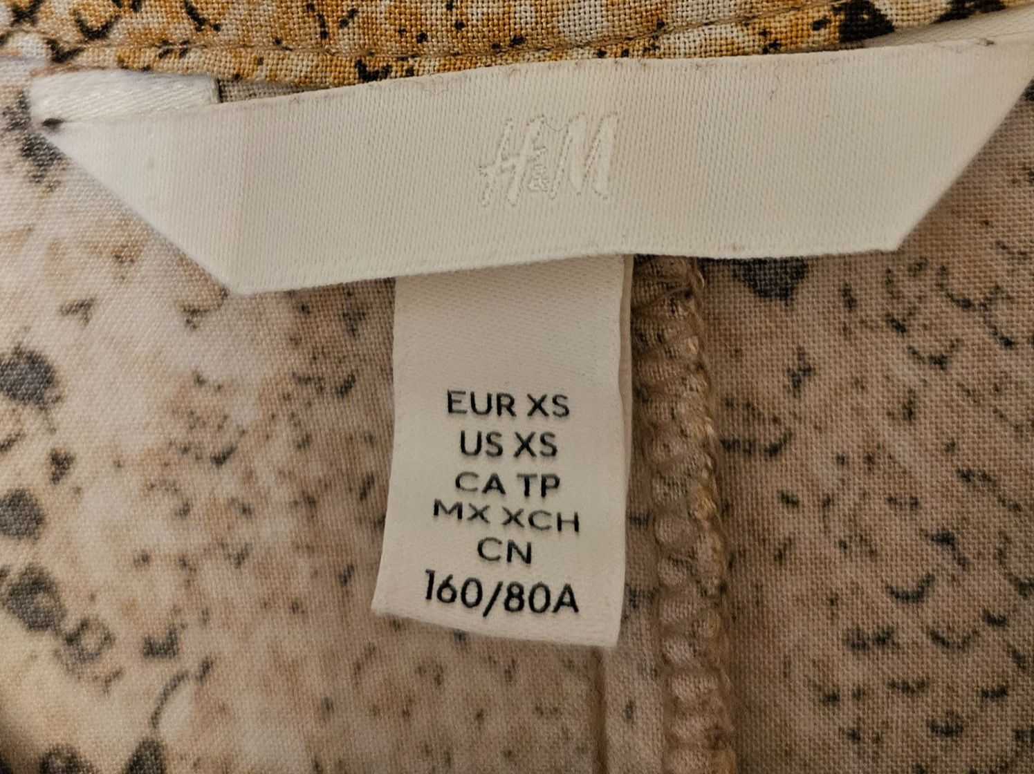 Vestiti: H&M Kleid, Gr. XS, Schlangenmuster – Usato da Kloten venduto da Kloten1 2