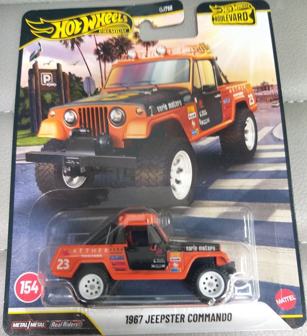 Jeep Modellini d'auto: Hot Wheels Premium Boulevard '67 Jeepster Commando – Nuovo e nell'imballaggio originale da Brugg AG venduto da Evilweevil