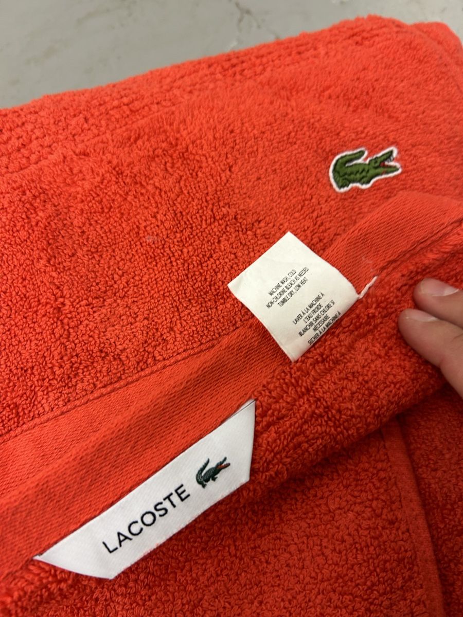 Lacoste Serviettes de bain: Lacoste Badetuch orange – D'occasion à Bern par floorball_zoro 1
