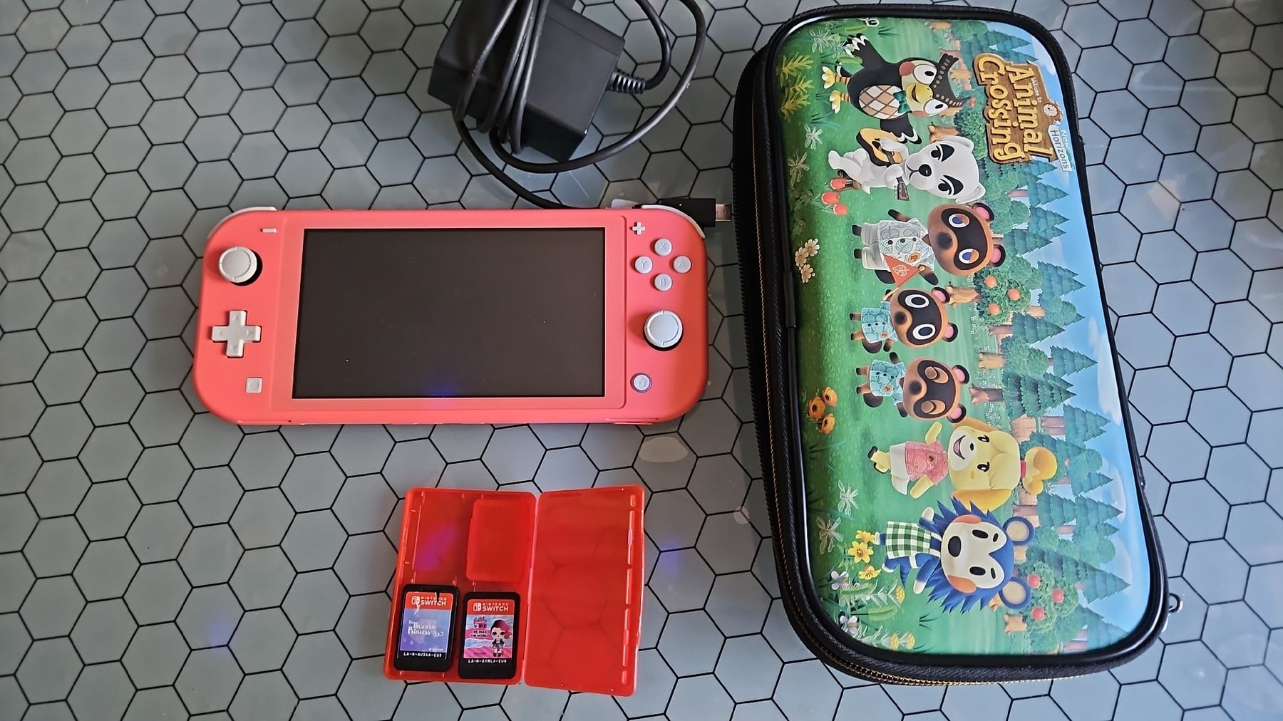 Nintendo Console: Nintendo Switch Lite avec 2 jeux  – Usato da Genève venduto da Pedro67