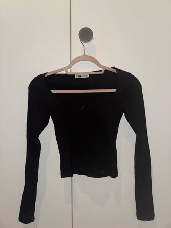 Haut manches longues noir taille XS bon état