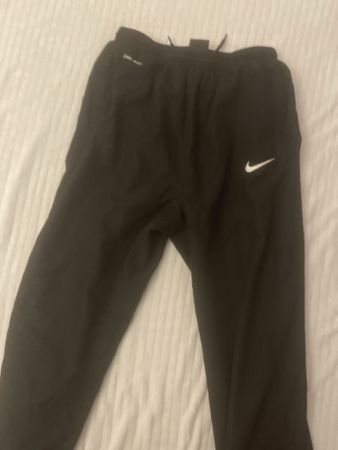 Pantalon Nike Dri-Fit noir, taille XL, parfait pour le sport