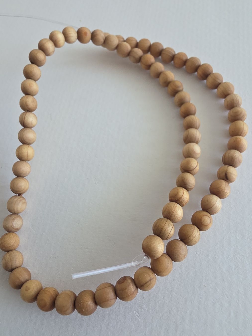 Perle (finte): Holzperlen Thuja 6mm. Strang – Nuovo e nell'imballaggio originale da Menziken venduto da Mirager 1