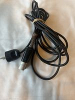 Altes Stromkabel mit Stecker und Kupplung Schweiz