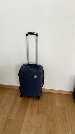Blauer Hartschalen-Rollkoffer mit 4 Rollen, Handgepäckgrösse