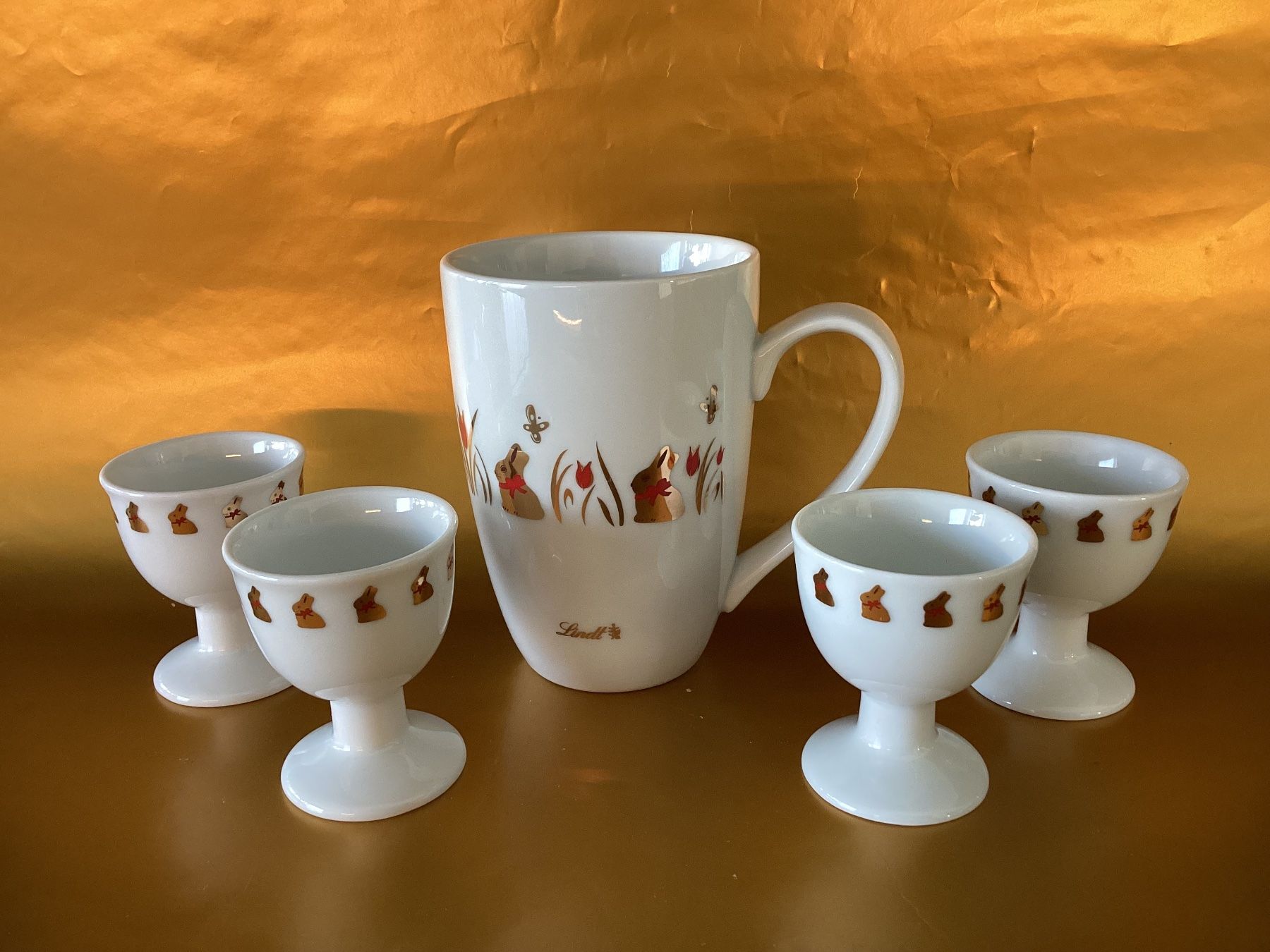 Altre Stoviglie: Lindt  / 4 Eierbecher und 1 Tasse – Usato da Beinwil am See venduto da kae_gh7c