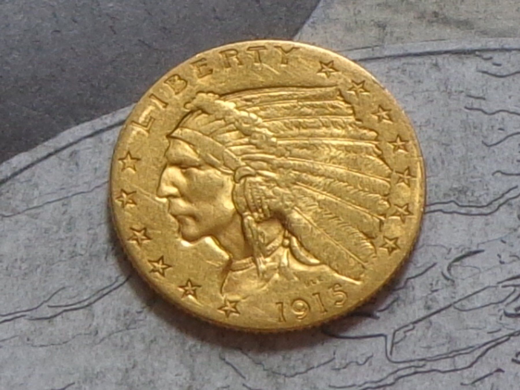 Tutti le monete: USA 2 1/2 Dollars 1915 "Indian Head . Quarter Eagle" – Usato da Pully venduto da UCA01