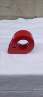 Roter Handabroller für Klebeband Permafix