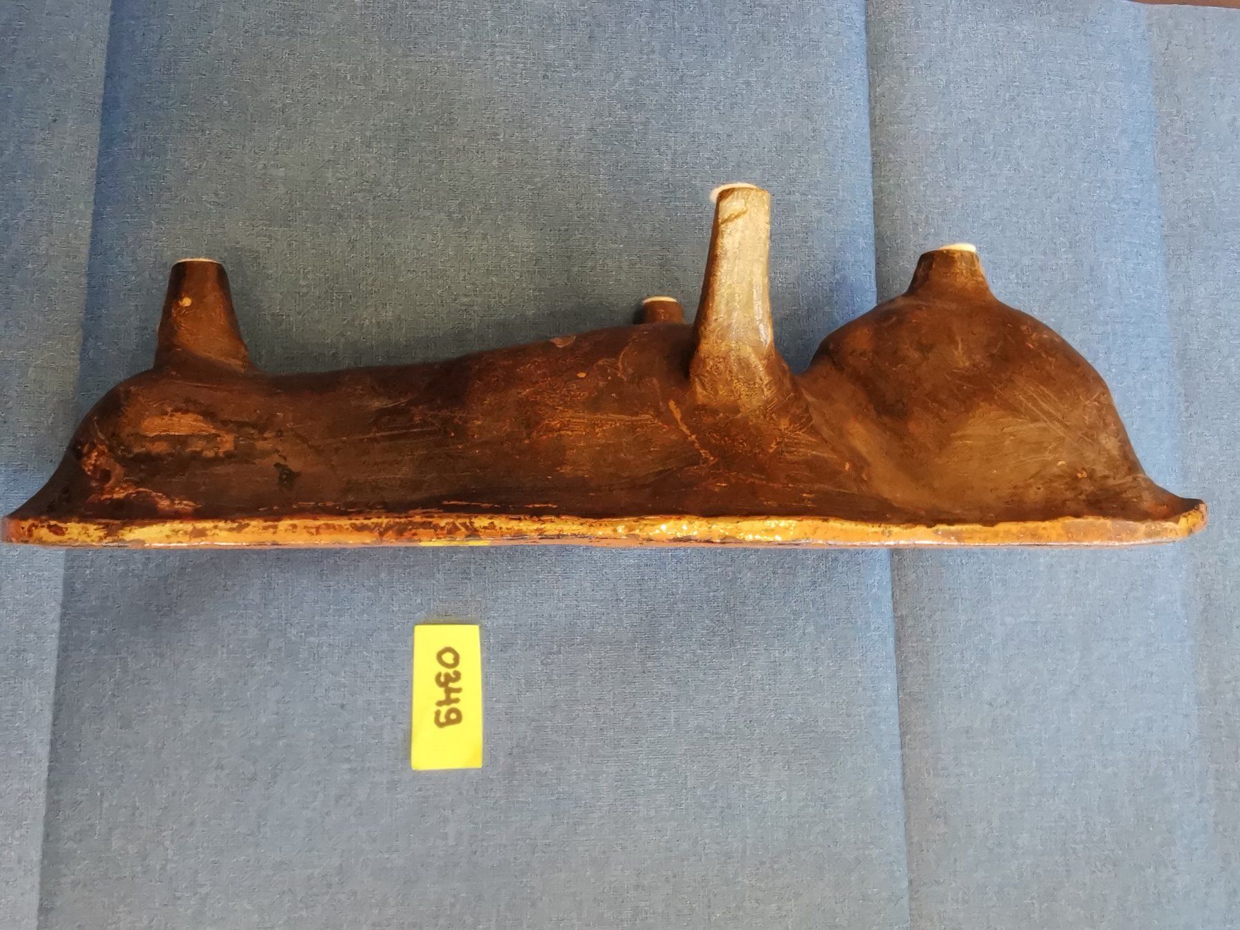 Teglie da forno: Fatschenkind-Backform, Hafnerware, Lebkuchenform 19./20.Jh. – Usato da Dübendorf venduto da aschiduebendorf 2