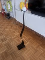 Moderner Kerzenständer schwarz geschwungen - orangische Form