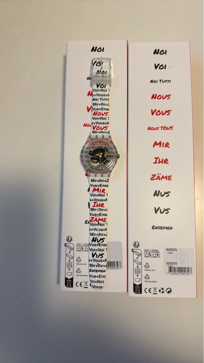 Swatch Smartwatch: Swatch watch clear strap multi-language print – Neuf avec emballage d'origine à Luzern par Alsu_Lucerne