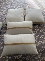 4 coussins assortis à l’annonce des rideaux