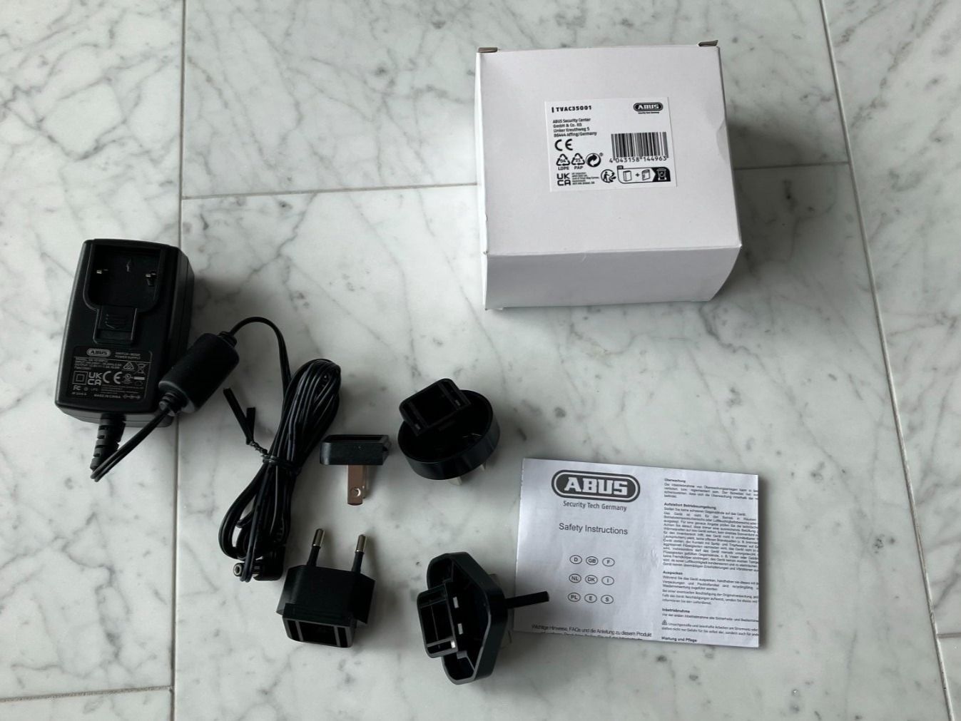 Caricabatterie: Abus Steckernetzteil TVAC35001 mit 12 Volt DC 1.5A – Nuovo e nell'imballaggio originale da Termen venduto da Timotei
