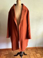 Superbe manteau orange rouille t 46