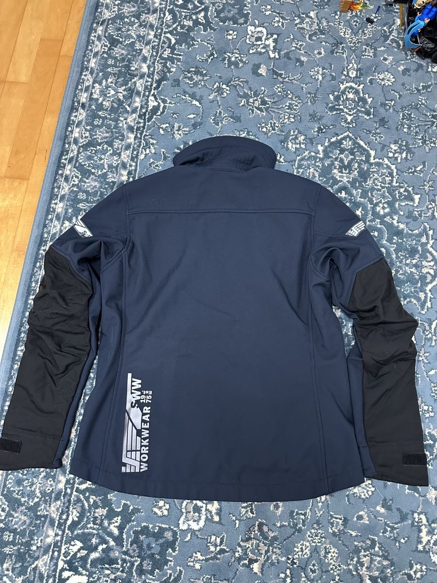 Snickers Giacche: Snickers Workwear Softshell Jacke blau  – Usato da St. Gallen venduto da 987JDBA 2