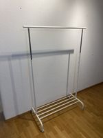IKEA White garment rack on wheels