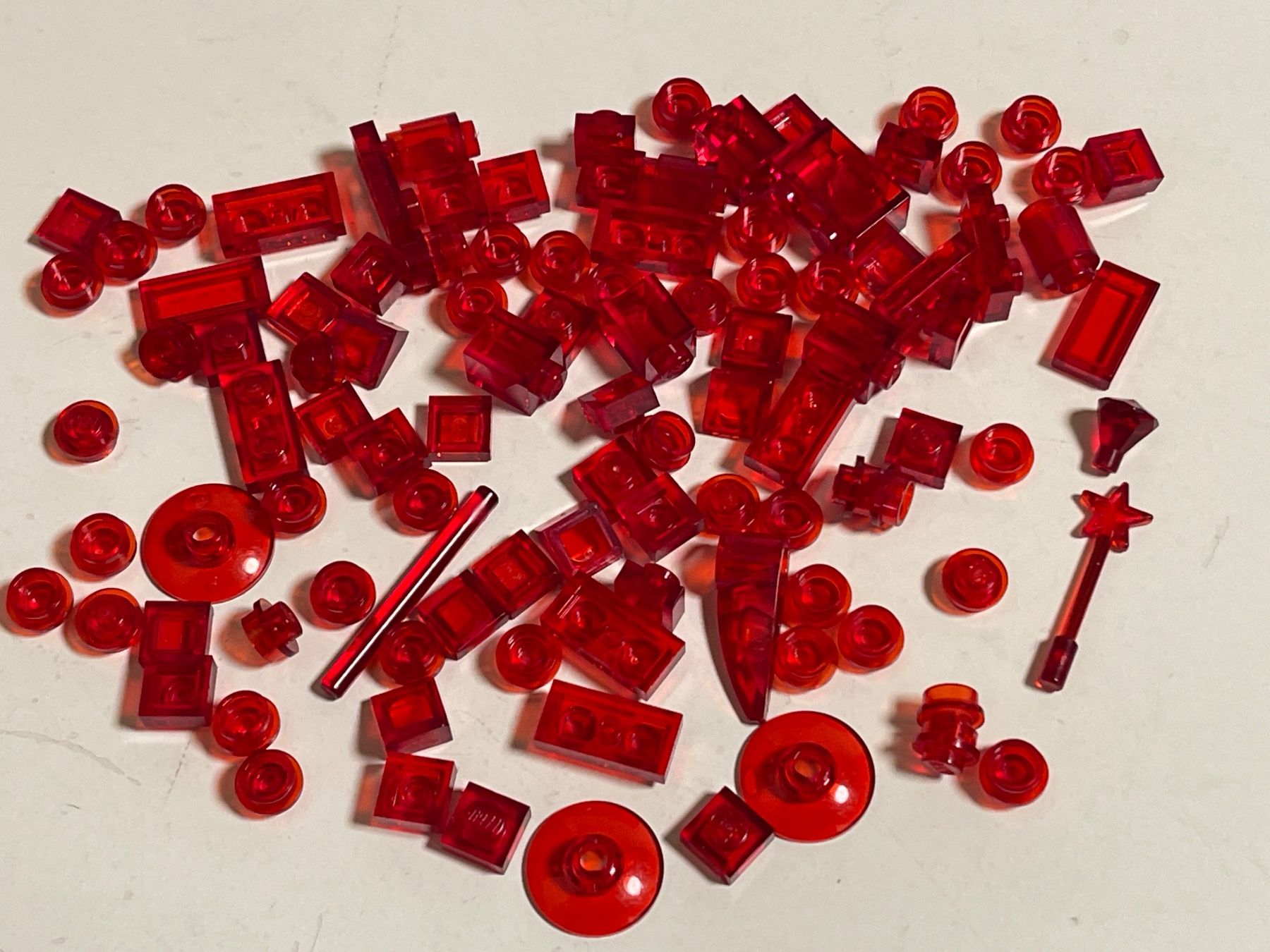 Spielzeuge: Lego 100 diverse rote Transparente teile – Gebraucht aus Gelterkinden von cobra0110