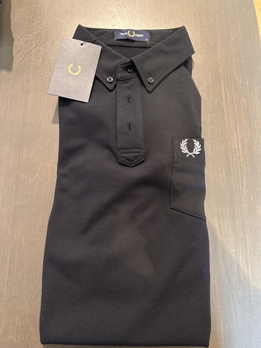 Fred Perry Magliette Polo: Fred Perry Poloshirt schwarz – Nuovo e nell'imballaggio originale da Olten venduto da threebumblebee