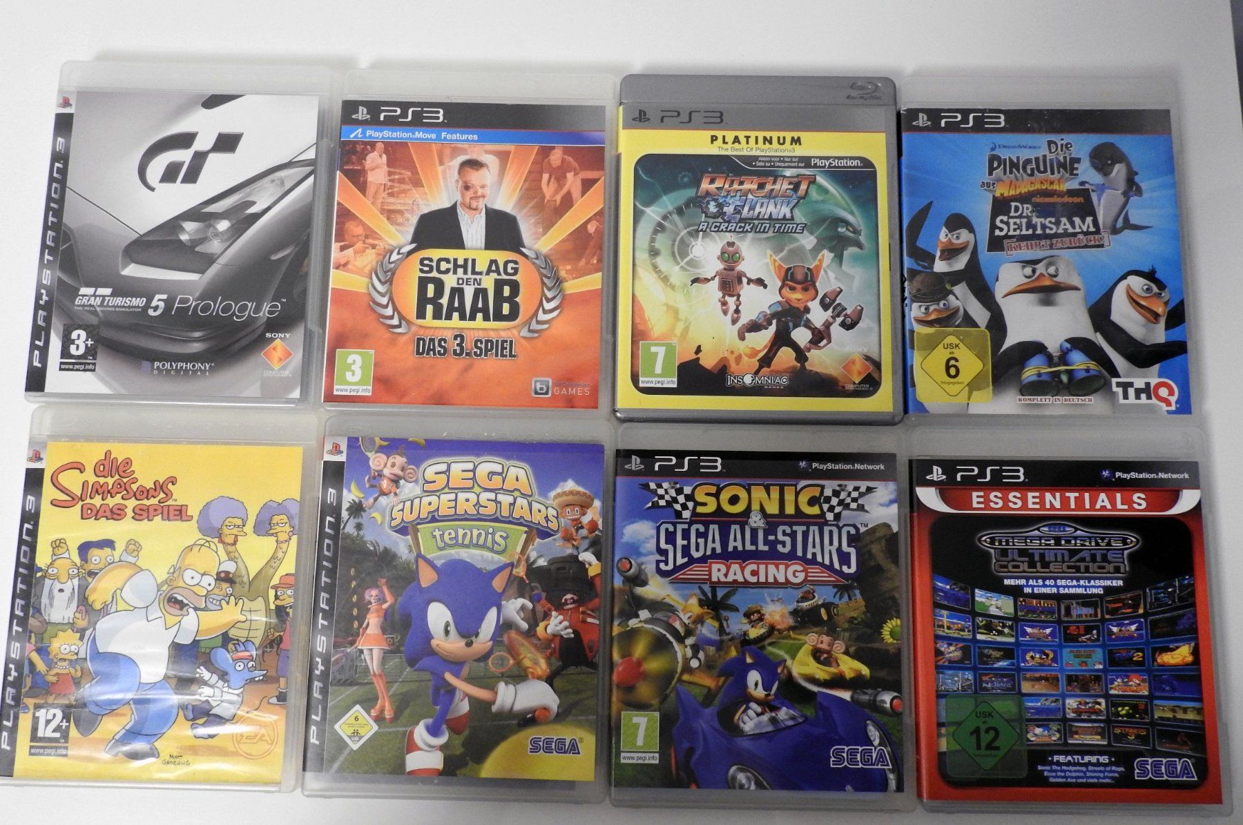 Sony Konsolen: 2 x Playstation 3 mit 48 Games + 4 Controllern – Gebraucht aus Zürich von  7