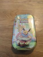 Prismatic Evolutions Tin En 