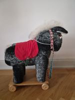 Ride-on horse toy with wheels good condition