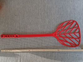 Teppichklopfer