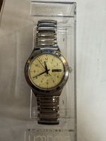 Swatch DayDate, montre élégante Irony