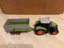 Traktor Claas mit Anhänger Spielzeug gebrauchter Zustand