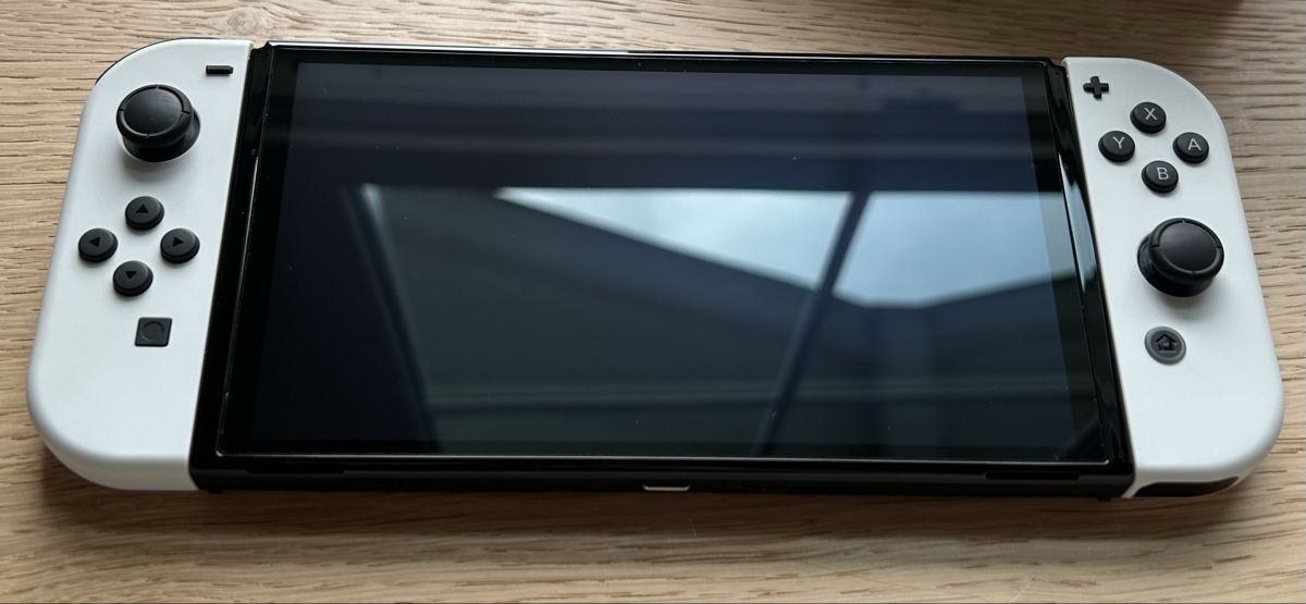 Nintendo Konsolen: Nintendo Switch OLED – Weiss, neuwertig – Neu (gemäss Beschreibung) aus Grabs von Jonas.2005 2