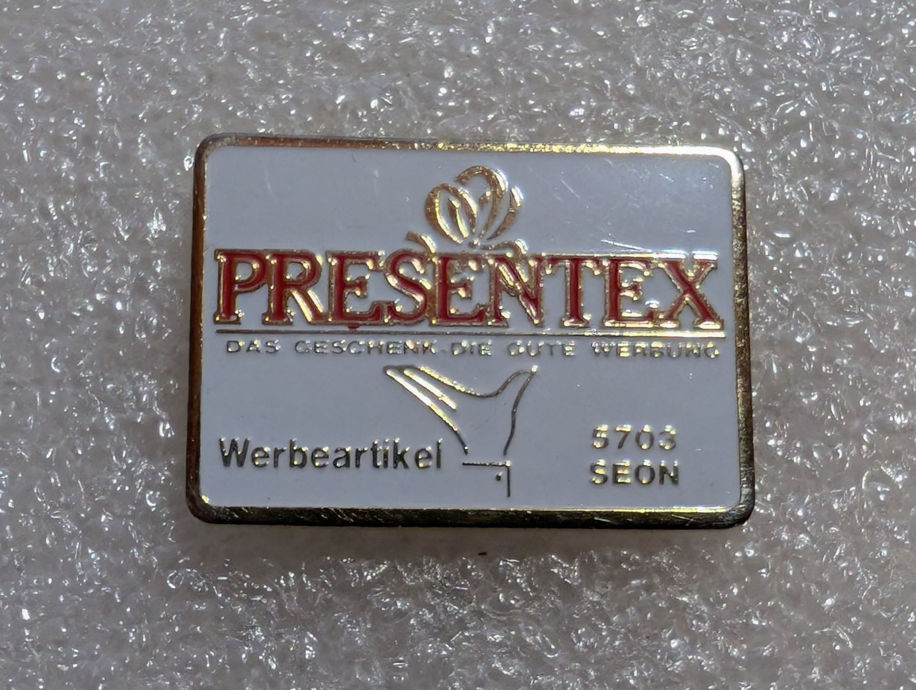 Plaketten & Abzeichen: Ansteckpin 267: Presentex – Gebraucht aus Oppligen von Pin-Fall-Shop