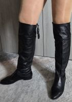 Bottes hautes en cuir.