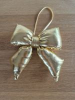 Goldener Weihnachtsbaumschmuck Schleife