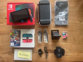 Nintendo Switch + Zubehör + Spielen - Neupreis 480,- CHF