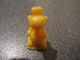 Chips-Figur gelber Dino