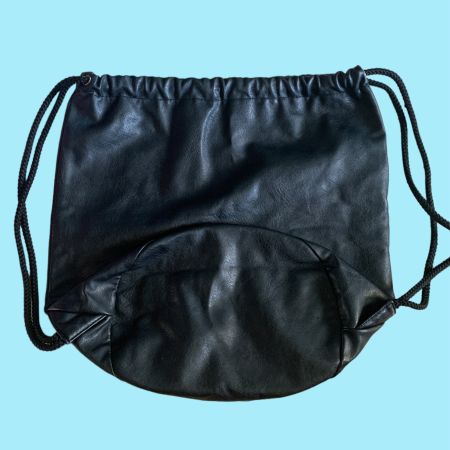 Star themed faux leather drawstring bag