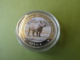 Uganda 1996, 1000 Shillings unzirk.  Nashorn