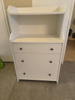 White chest of drawers with shelf