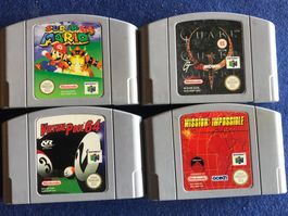 4 jeux nitendo 64 super Mario, Mission, virtual pool, quake.