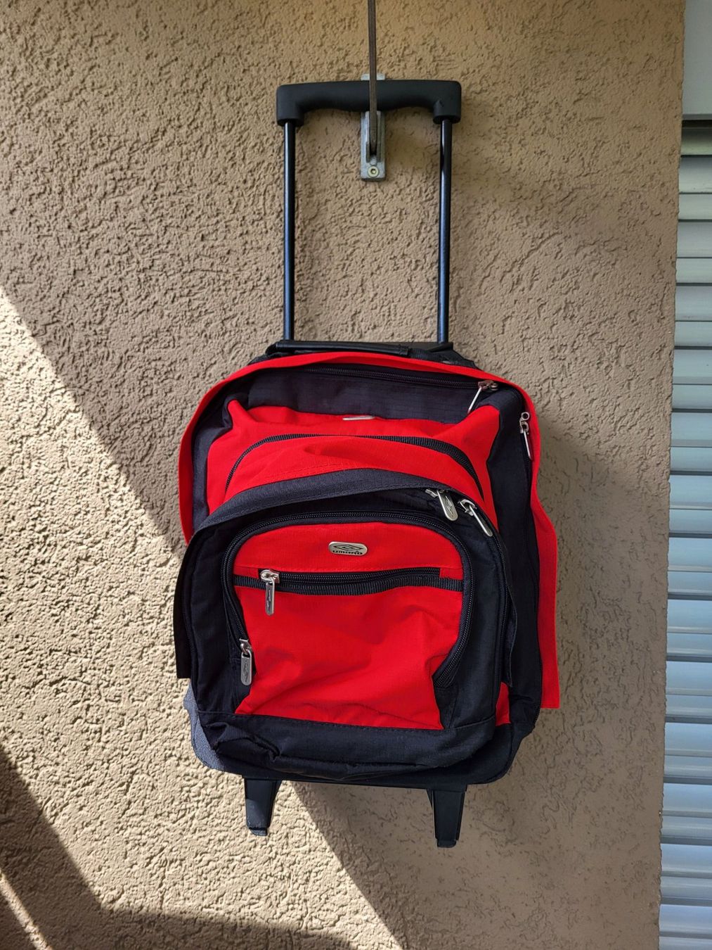 Valises de voyage: Rollkoffer von Umbro, mit integriertem Rucksack – D'occasion à Weesen par Banco
