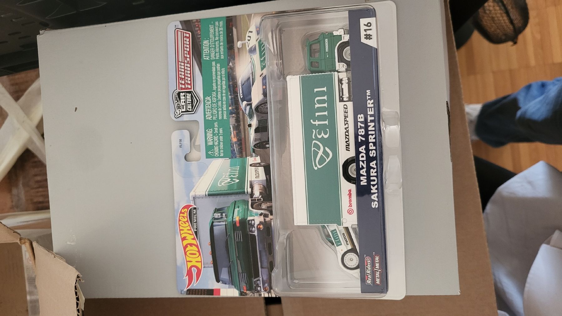 Hot Wheels Modellini d'auto: Hot Wheels Team Transport Mazda 787B Sakura Sprinter – Nuovo e nell'imballaggio originale da Jona venduto da mjo_f5t2