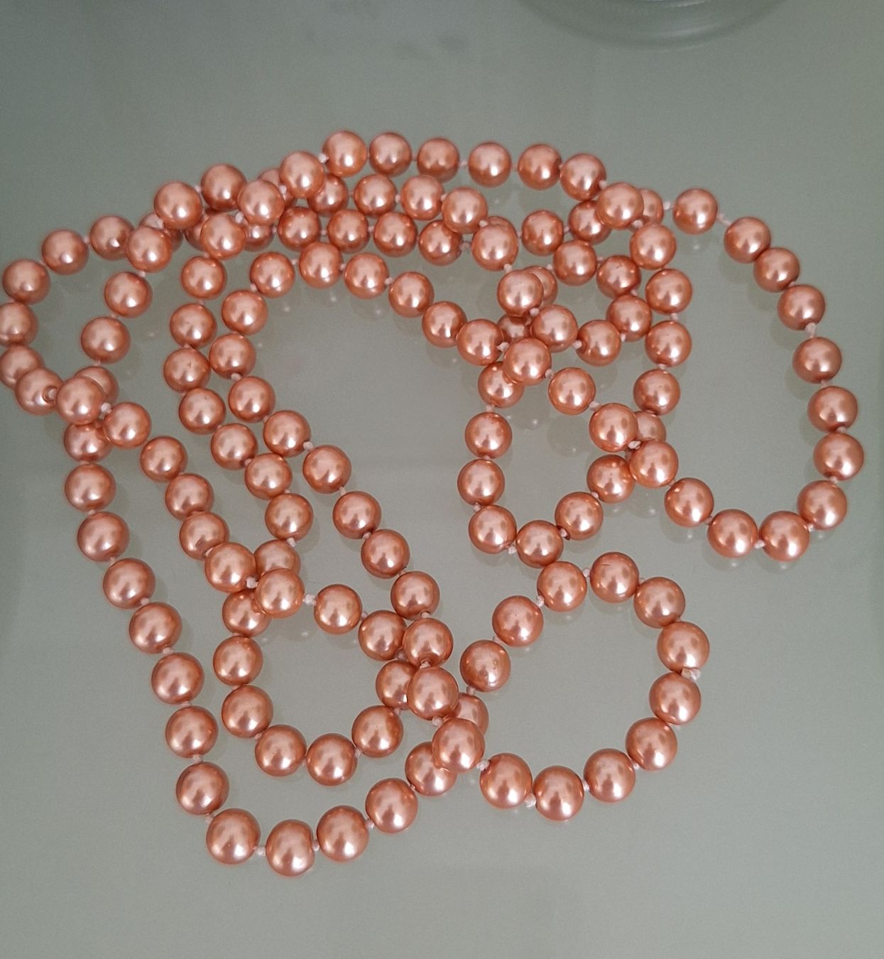 Catenine: lange Apricot.Farbene Perlenkette – Usato da Kerzers venduto da ExpressoTerreno
