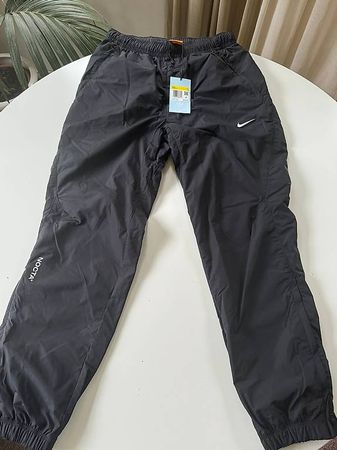 Nike NOCTA Trainerhose blau, neu und ungetragen