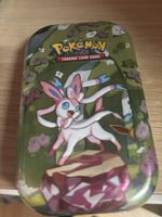 Pokemon Prismatic Evolutions: Sylveon Mini Tin Tins