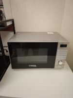 Mikrowelle Weber silber gebraucht mit Kratzer oben