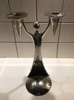 Origineller Kerzenständer, Figur mit hochgehobenen Armen