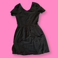 Black mini skater dress with open back