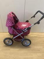 Puppenwagen pink mit Blumenmuster in gutem Zustand