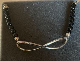 Schönes Thomas Sabo Armband, Onyx mit Infinity, Silber
