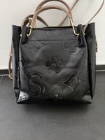 Damen Handtasche schwarz mit Muster guter Zustand 40