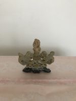 Specksteinfigur mit Löwe